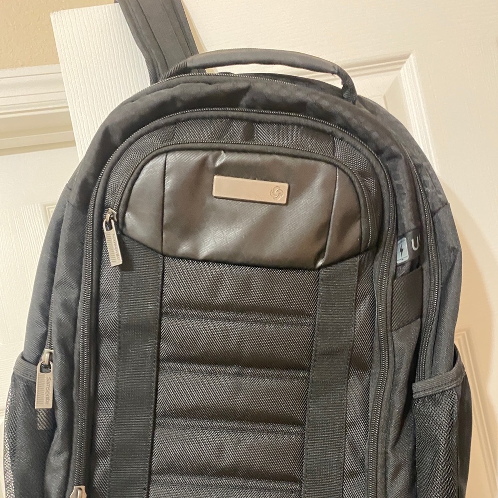 Brand new backpack have access to usb charger .